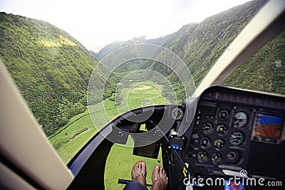 Helicopter flying over Hawaii Stock Photo