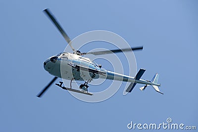 Helicopter holding video camera Stock Photo