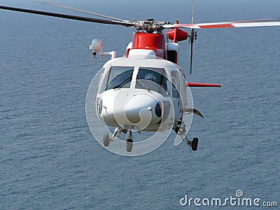 Helicopter hovering Stock Photo