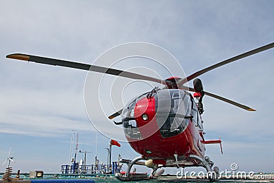 Helicopter on offshore platform Stock Photo