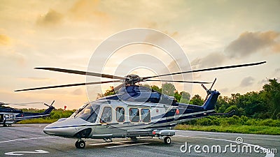 Helicopter parking in Hangar and prepare for fly by support team Stock Photo