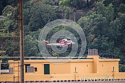 Helicopter for rescues of victims Morandi bridge in Genoa, Italy Editorial Stock Photo