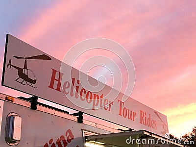 Helicopter ride at fairgrounds at sunset Editorial Stock Photo