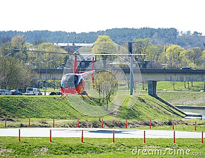 Helicopter Robinson R44 in Vilnius, Lithuania Editorial Stock Photo