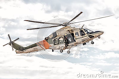 Helicopter of search and rescue service in action Stock Photo