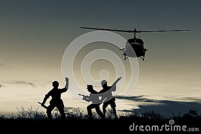 Helicopter and soldier silhouette Stock Photo