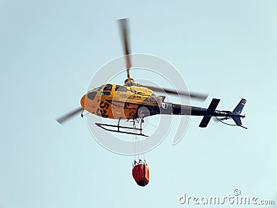 Helicopter with tank Editorial Stock Photo