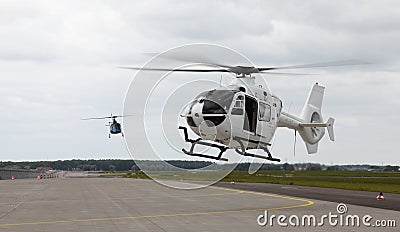 Helicopters landing Stock Photo