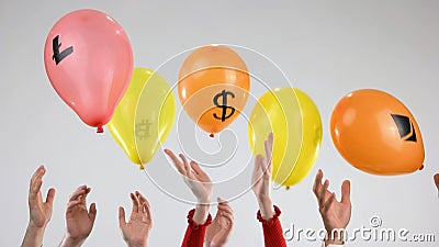 Helium balloons as symbol of unreliable currency. Stock Photo