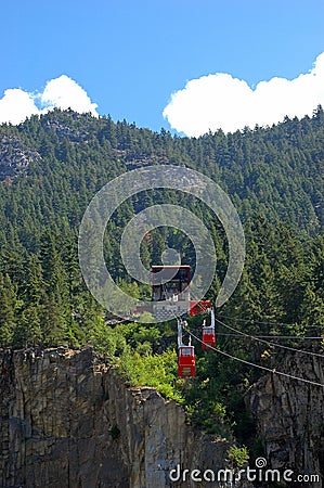 Two Cable Cars in Mountainous Terrain Stock Photo