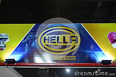 Hella sparkplugs and horns booth sign at Inside racing bike festival in Pasay, Philippines Editorial Stock Photo