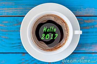 Hello 2017 inscription on top view morning cup of coffee. Happy New Year and Christmas concept Stock Photo