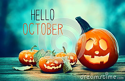 Hello October with pumpkins at night Stock Photo