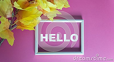 Hello text in silver frame and pink background Stock Photo