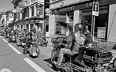 Hells Angels with their Harley Davisdson motor bikes driving through Longstreet of ZÃ¼rich City Editorial Stock Photo