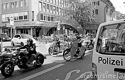Hells Angels with their Harley Davisdson motor bikes driving through Longstreet of ZÃ¼rich Editorial Stock Photo