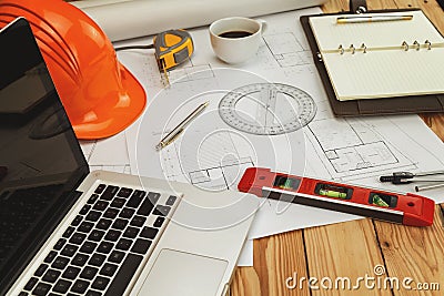 Helmet and architectural equipment. on blueprint Stock Photo