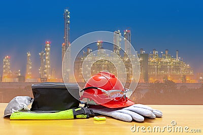 Helmet in industry site and Petrochemical oil refinery plant, site worker background safety first concept Stock Photo