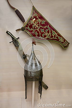 Helmet, sword, quiver for arrows of a warrior from the Middle Ages Editorial Stock Photo