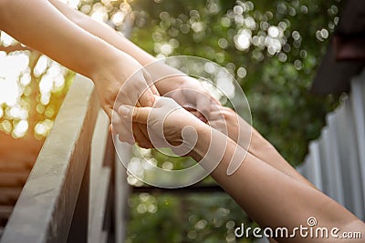 Help concept hand reaching out for help with light flare Stock Photo