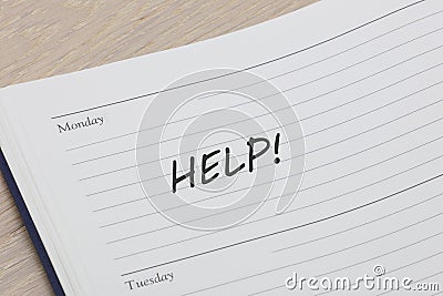 Help diary reminder appointment open on desk Stock Photo
