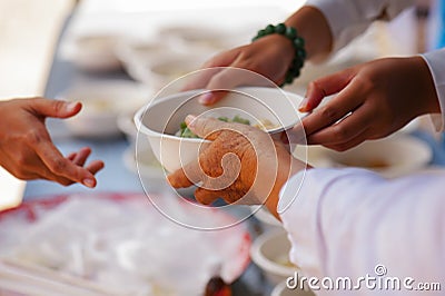 Help with feeding homeless people to alleviate hunger. poverty concept Stock Photo