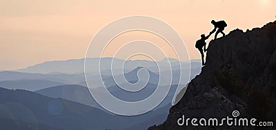 Help mountaineering & peak performance Stock Photo