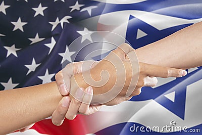 Helping hands with american and israel flags Stock Photo