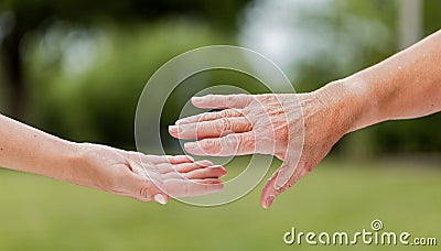 The helping hands for elderly home care Stock Photo