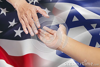 Helping hands with israel and american flags Stock Photo