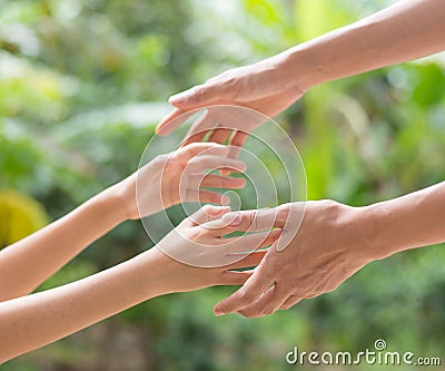 Helping hands Stock Photo