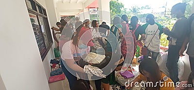 Helping others are good and charity, interms of calamity Editorial Stock Photo