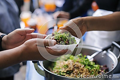 Helping to alleviate hunger from the humanitarian of people in society: concepts food sharing Stock Photo