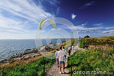 People walk on the Suomenlinna island at the hot summer day Editorial Stock Photo