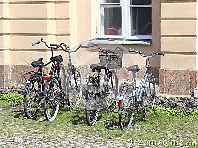 Helsinki, Finland. Bikes on the parking near house Editorial Stock Photo