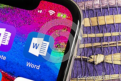 Microsoft Word application icon on Apple iPhone X screen close-up. Microsoft office word icon. Microsoft office on mobile phone. S Editorial Stock Photo