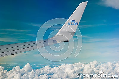 Helsinki, Finland - 7 July 2021: KLM Plain wing over blue sky. Flight from Helsinki to Amsterdam Editorial Stock Photo