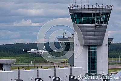 An Airbus A350, operated by Finnair, landing at Helsinki-Vantaa airport Editorial Stock Photo