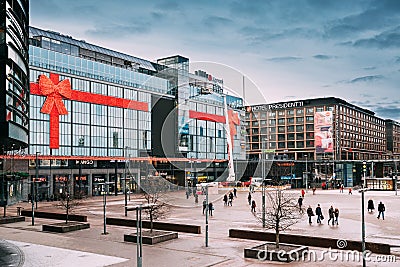 Helsinki, Finland. People Walking Near Original Sokos Hotel Presidentti And Kamppi Shopping Editorial Stock Photo