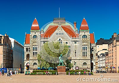 Helsinki - June 2019, Finland: Building of the Finnish National Theatre and the Statue of Aleksis Kivi Editorial Stock Photo