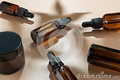 Hemp cbd oil serum in glass dropper bottle with cannabis leaves shadows, Moisturizing cream, Serum, lotion, essential Stock Photo