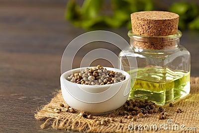 Hemp seeds and oil Stock Photo