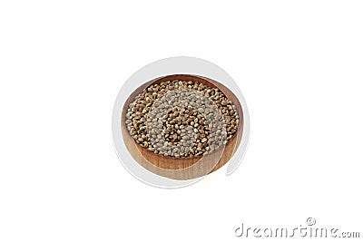 Hemp seeds in wooden bowl on white background. Cannabis seeds are source of Omega-3 fatty acids, protein, magnesium and other Stock Photo