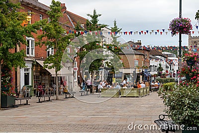 Diners eating outide in the Market Place on a summer's evening Editorial Stock Photo