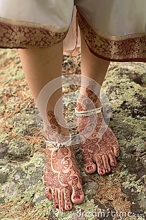 Henna on feet of bride from India Stock Photo