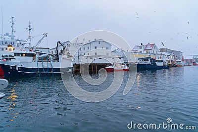 Henningsvaer village in Lofoten islands, Nordland county, Norway, Europe. Ships and boats in marina port in harbor in winter Editorial Stock Photo