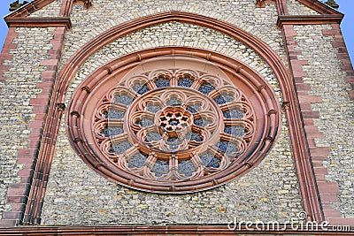 Heppenheim, Germany - Round ornate window of old church called St. Peter in Heppenheim city Stock Photo