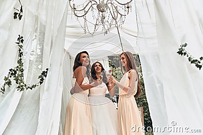 With her ladies by her side. Stock Photo