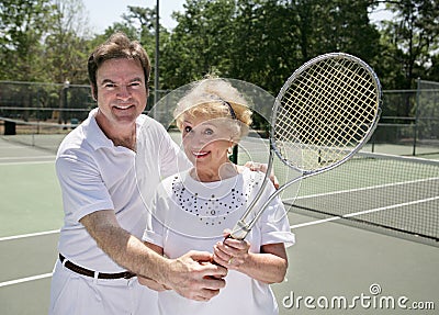 Her Tennis Lesson Stock Photo
