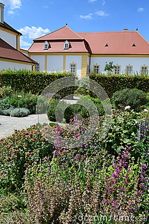 Herb ornamental garden in Schlosshof garden professionally planted with groups of herbs and perennials Stock Photo